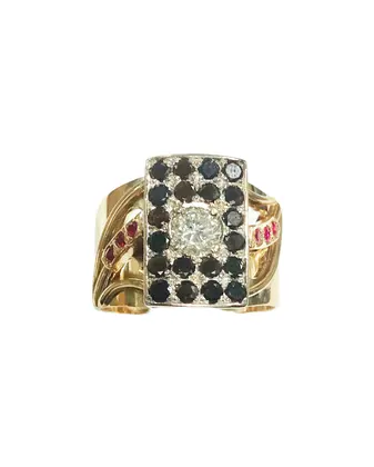 Anillo con diamante central , rubies y diamantes negros