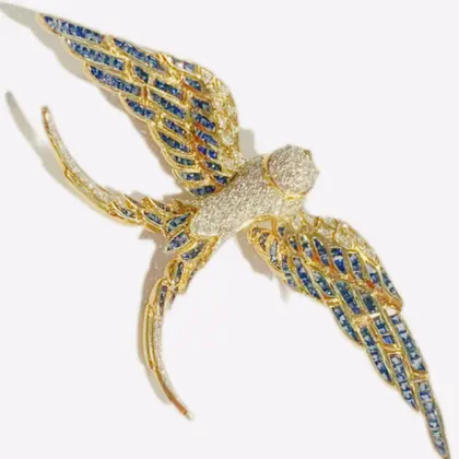Broche golondrina diamantitos y zafiros oro amarillo